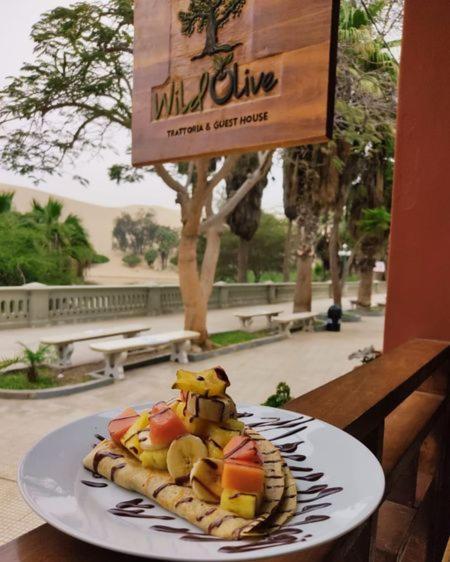 Wild Olive Guest House Ика Экстерьер фото
